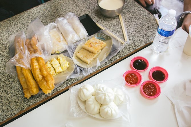 4-Hour Morning Cycling City Tour (incl. breakfast) - Wenchang Temple and Shuanglian Market show daily Taipei