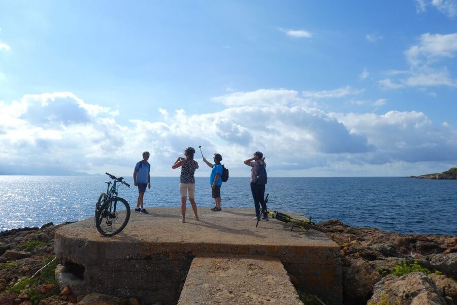 Alghero: Small Beaches E-Bike Tour with Aperitivo - Starting among vines, pines, and Mediterranean plants