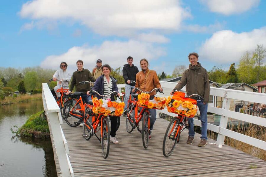 Amsterdam: Cheese Tasting, Windmill & Countryside Bike Tour - Crossing toward the IJ River and Durgerdam