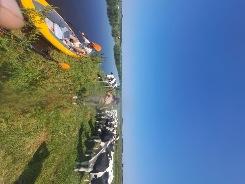 Amsterdam: Countryside Bike and Kayak Guided Tour - A useful break in a village setting