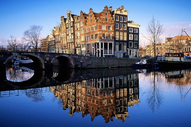 Amsterdam: E-Bike Sightseeing Tour - The guides are a major part of the experience