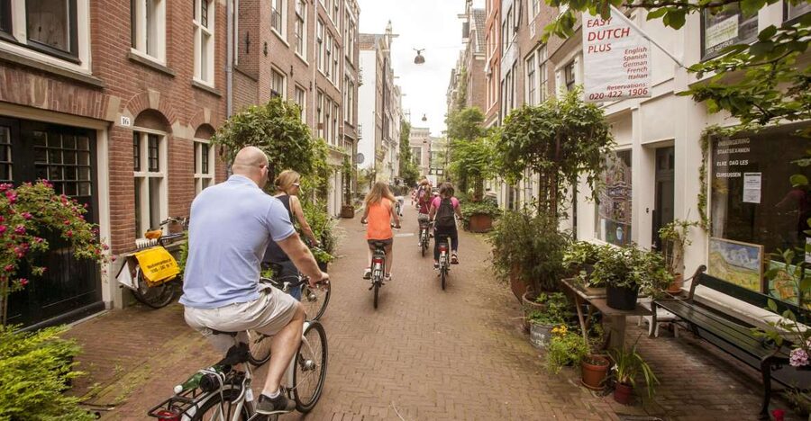 Amsterdam: Hidden Gems & Highlights Guided Bike Tour - Why a bicycle is the right way to see Amsterdam