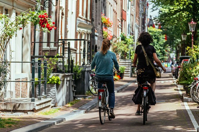 Amsterdam PRIVATE Bike Tour With Locals: Bike & Local Snack Included - The Skinny Bridge and the Amstel