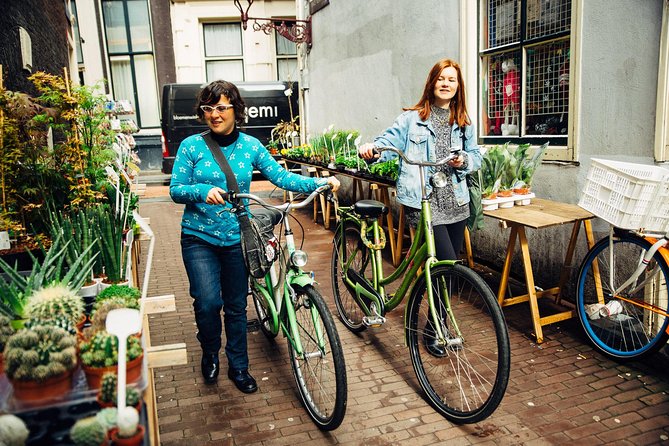 Amsterdam PRIVATE Bike Tour With Locals: Bike & Local Snack Included - The local snack and the value of a private guide