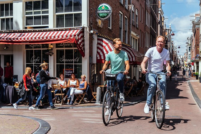 Amsterdam PRIVATE Bike Tour With Locals: Bike & Local Snack Included - Westerkerk and the canal belt