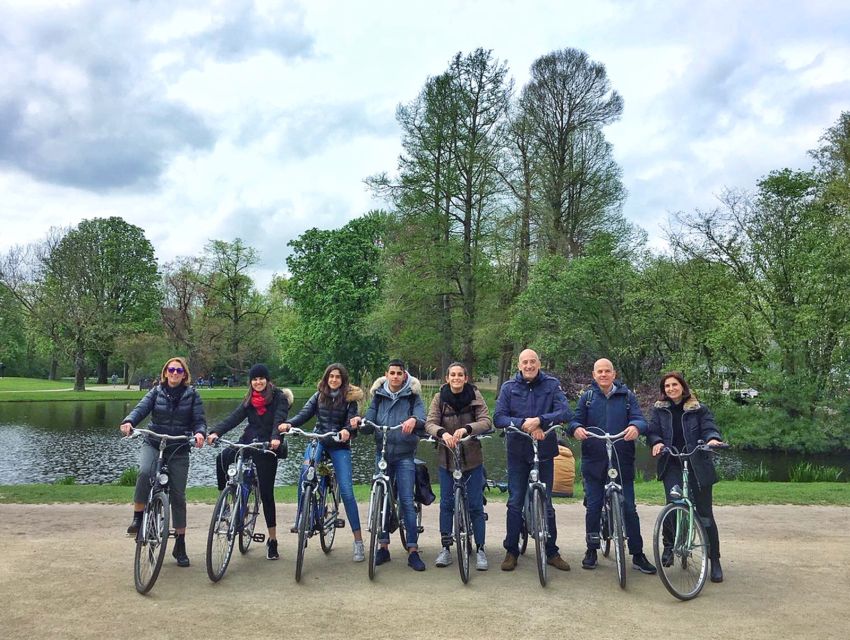 Amsterdam: Private City Bike Tour in italian - The Canal Belt and its narrow merchant houses
