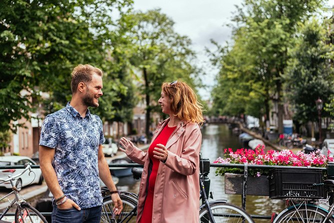 Amsterdam Private Tour: Highlights & Hidden Gems by Bike or Foot - Exploring the Red Light District with context
