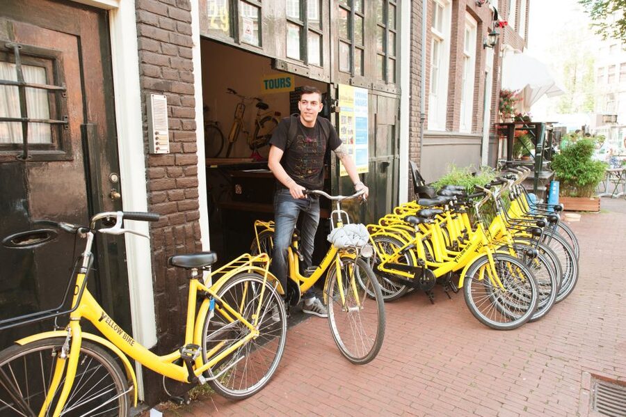 Amsterdam: Relaxed City Highlights Guided Bike Tour - Vondelpark at an easy pace