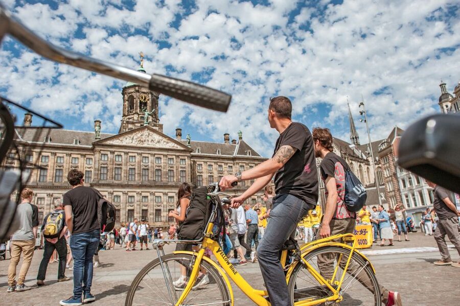 Amsterdam: Relaxed City Highlights Guided Bike Tour - The Skinny Bridge and the final canals