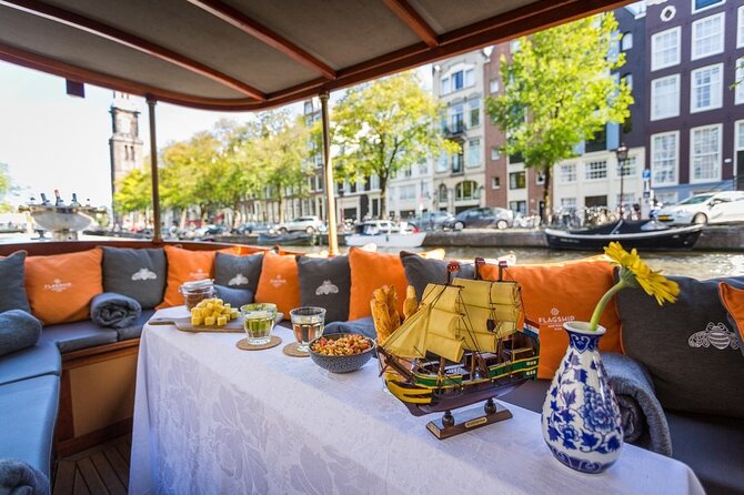 Amsterdam Small-Group Bike Tour With Canal Cruise, Drinks, Cheese - The canal cruise, cheese, and drinks
