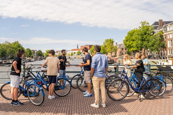 Amsterdam Small-Group Bike Tour With Optional Canal Cruise - Bridges, canals, and Amsterdam’s compact scale