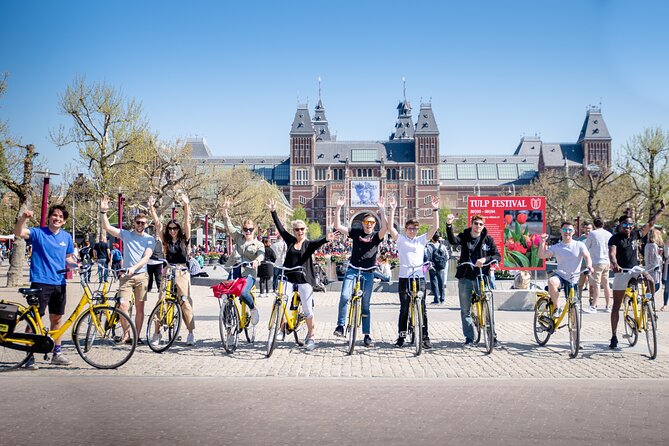 Amsterdam Small Group Bike Tour - Setting off from Nieuwezijds Kolk