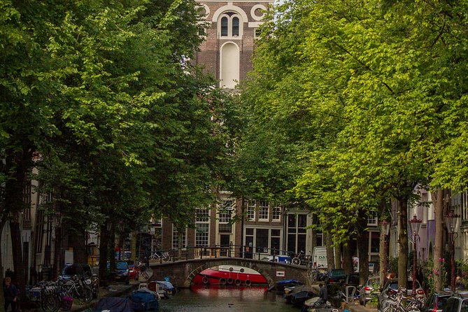 Anne Frank Private Bike Tour in Amsterdam - Spinoza Monument and the city beyond Anne Frank