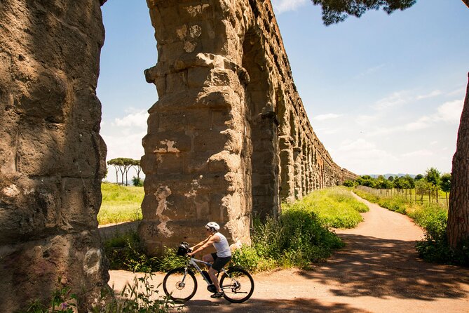 Appian Way, Catacombs and Aqueducts Park Tour with Top E-Bike - Leaving Rome through Porta San Sebastiano