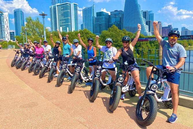 Austin Good Vibes E-Bike Tours - Starting at the ATX sign and Central Library