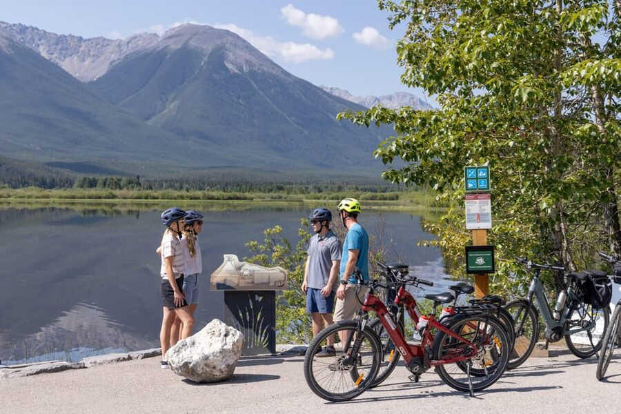 Banff: Mountain Lakeside Guided E-Bike Tour - Lake Minnewanka and the town beneath the water