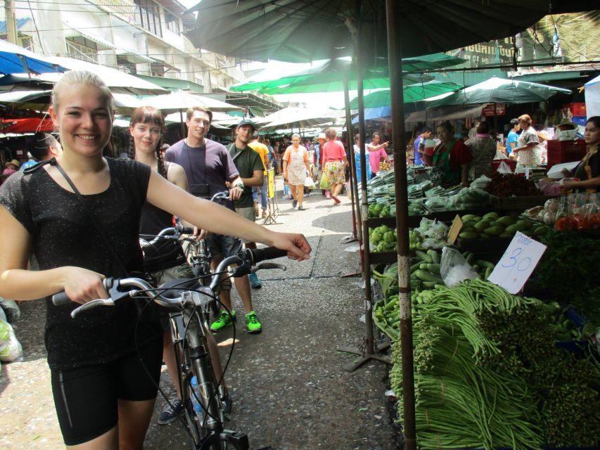 Bangkok Full-Day Bike Tour with Boat Transfer and Lunch - Back lanes, highway communities, and the city’s rough edges