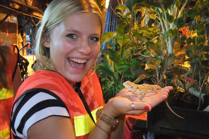 Bangkok Hidden Paths Night Biking Tour with Street-food Meal - Along the Chao Phraya River and across by ferry