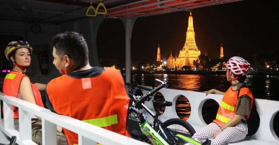 Bangkok: Night Bike Ride and Dinner at a Local Restaurant - Starting across the river in Thonburi