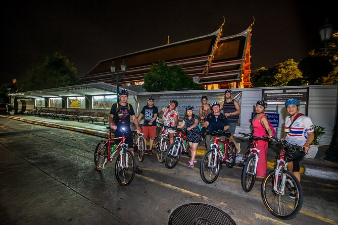 Bangkok: Night Bike Tour with Temples & Flower Market Visit - The Ferry Ride Across the Chao Phraya
