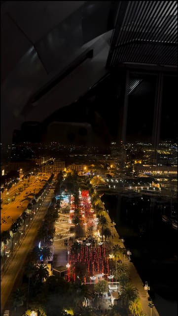 Barcelona: Christmas Lights and Markets Bike Tour - Hospital de Sant Pau after dark