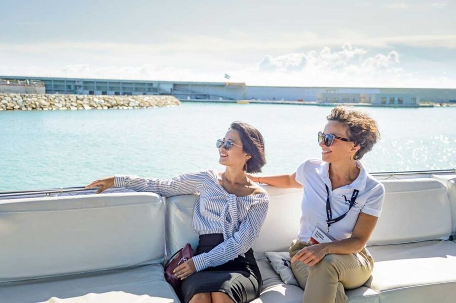 Barcelona: E-Bike Tour with Montjuic Cable Car & Boat Ride - Taking the funicular up Montjuïc