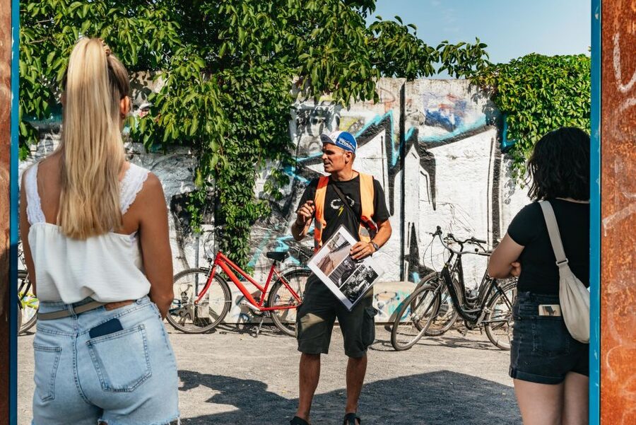 Berlin: Cold War & Berlin Wall History Guided Bike Tour - Pace, roads, weather, and practical comfort