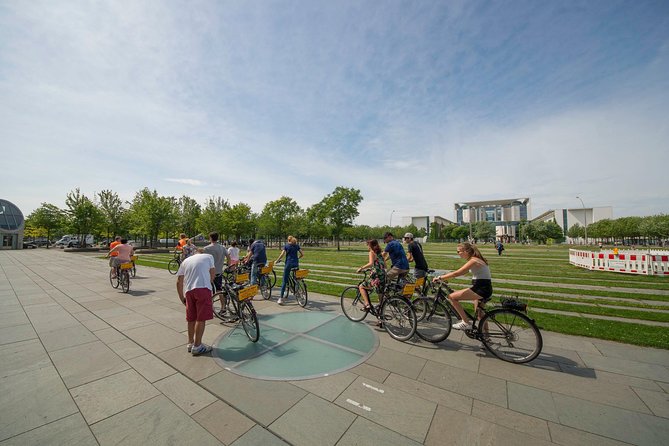Berlin Highlights Sightseeing Bike Tour in Small Groups - Checkpoint Charlie shows Berlin’s divided past