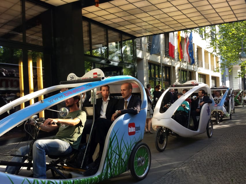 Berlin: Illuminated Berlin by Bike Taxi - Potsdamer Platz and its video projections