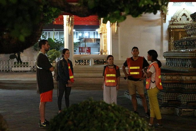 Bike Bangkok at Night with Thai Dinner - Wat Arun after dark and the first ferry crossing