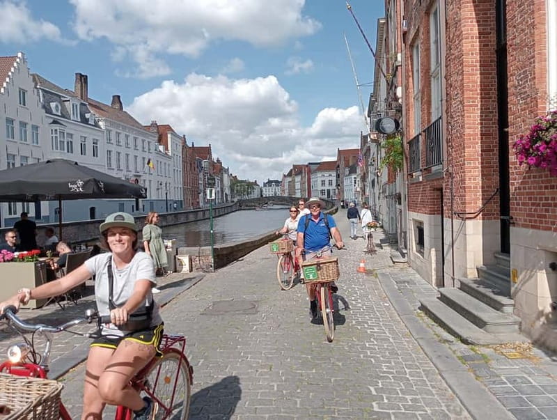Bruges: Guided Retro Bike Tour of Highlights and Hidden Gems - The Dijver route reveals Bruges from the water