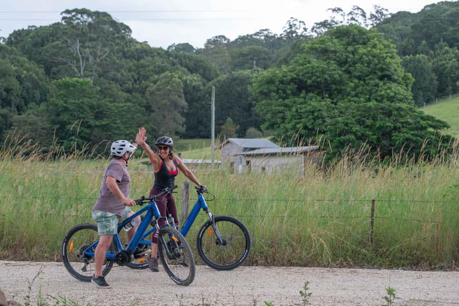 Byron Bay: Northern Rivers Rail Trail E-Bike Hire & Shuttle - Rainforest, countryside, and old railway character