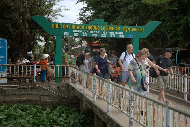 Cai Be Mekong Delta Tour: Cooking Class, Cycling & Craft Villages - Coconut candy, rice popcorn, and local music