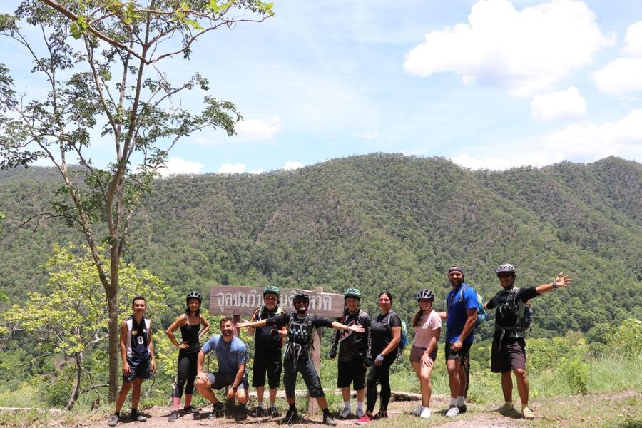 Chiang Mai: Boat Ride and Cycling Tour to Sticky Waterfall - Crossing Mae Kuang reservoir by boat