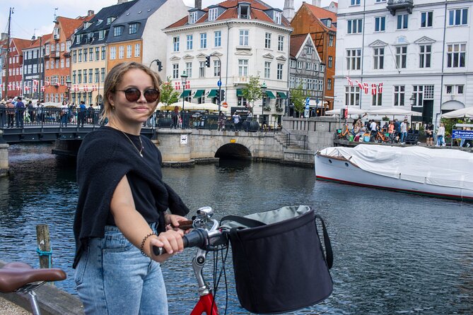 Copenhagen Highlights 3 Hour Bike Tour with local Guide - Kongens Nytorv and the color of Nyhavn