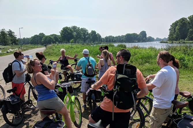 Countryside Bike Tour from Amsterdam: Cheese, Clogs & a Windmill - Starting near the OBA and crossing the IJ