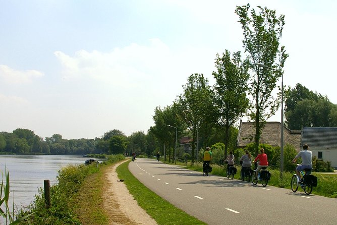 Countryside Bike Tour from Amsterdam: Cheese, Clogs & a Windmill - Waterland by bicycle, with canals and wide fields