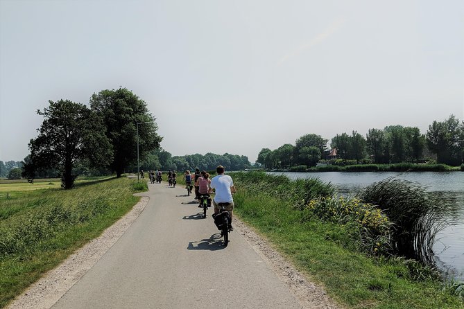 Countryside Bike Tour from Amsterdam: Cheese, Clogs & a Windmill - Cheese, clogs, and the most hands-on stop
