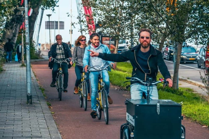 Discover Rotterdam: Classic Highlights Bike Tour by a Local - De Brandgrens and the cost of rebuilding