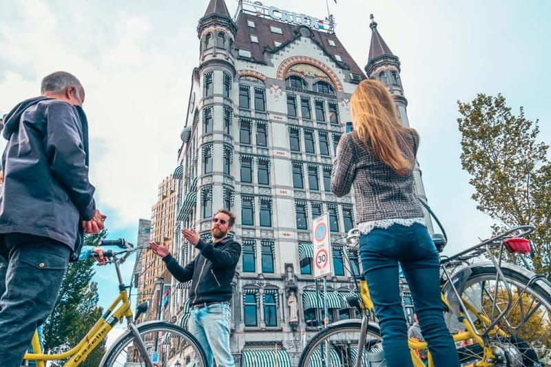 Discover Rotterdam: Classic Highlights Bike Tour by a Local - Hotel New York and the riverfront story