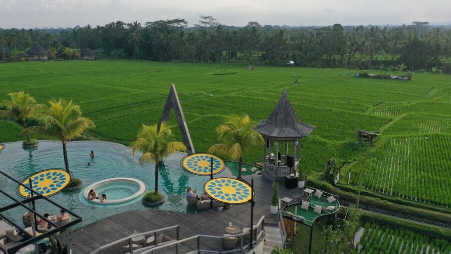 E-Bike: Ubud Rice Terraces & Traditional Villages Cycling - Visiting a Balinese family compound