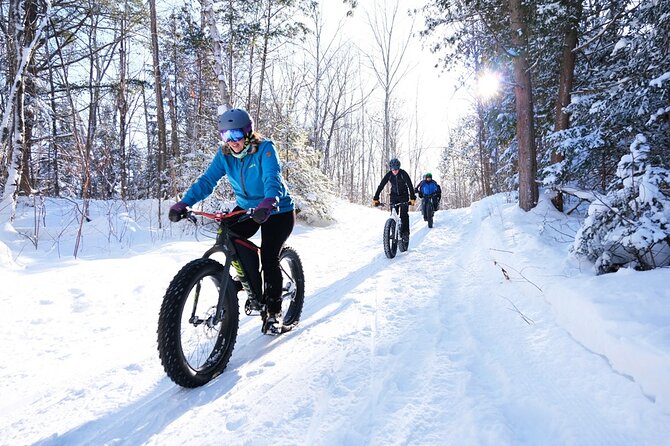Electric Fat Biking Adventure in Banff | Small Group Adventure - Bow Falls: a short stop with real power