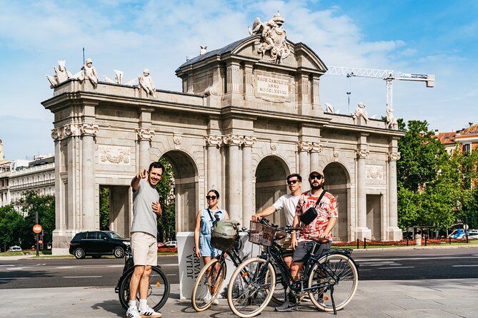 Explore Madrid by bike taking photos with Benja - Puerta de Alcalá and the tree-lined Retiro Park