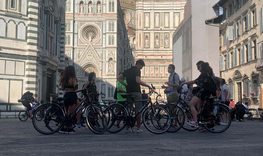 Florence Bike Tour & Sunset & Piazzale Michelangelo - Riding back through Florence at dusk