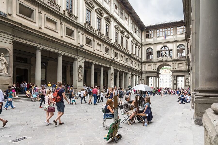 Florence: City Sightseeing Guided Bike Tour - Crossing into Oltrarno and the artisans quarter