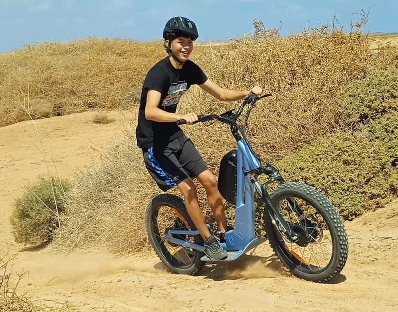 From Corralejo: Fuerteventura Guided E-Bike/E-scooter Tour - Walking up Calderon Hondo crater