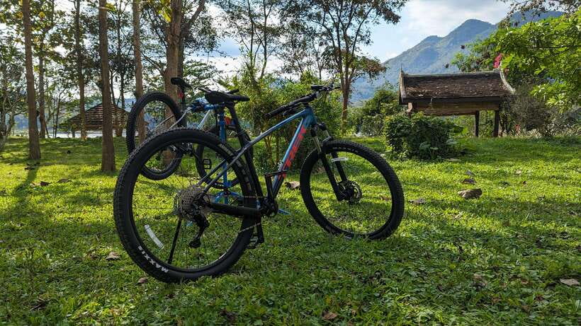 From Luang Prabang: Guided Mountain Bike Tour with Lunch - Three hours of rivers, rice fields, and village roads