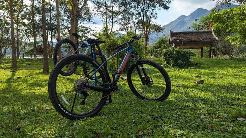 From Luang Prabang: Guided Mountain Bike Tour with Lunch - The optional afternoon: kayaking, Pak Ou Caves, and sunset
