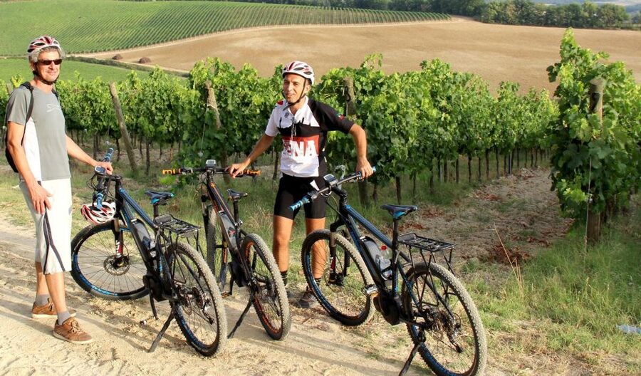 From Siena: Chianti Countryside E-Bike Tour w/ Lunch & Wine - Monteriggioni and its 13th-century walls