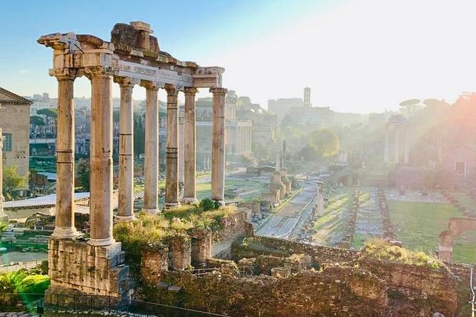 Gems of Rome: Small Group E-Bike Tour with Street Food stops - The Colosseum sets the scene